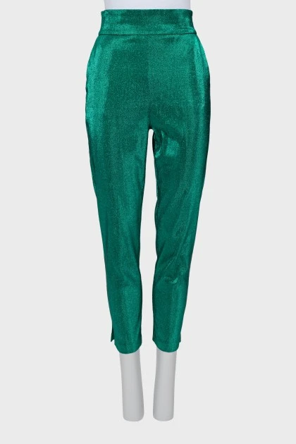 Green trousers with slits at the bottom