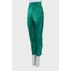 Green trousers with slits at the bottom