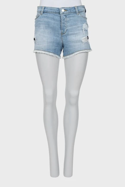 Blue denim shorts with ripped effect