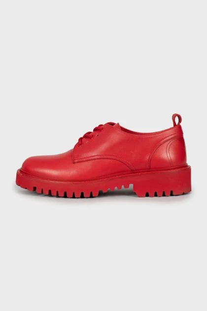Red oxfords with embossed logo