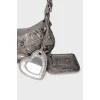 Silver bag with hanging mirror