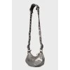 Silver bag with hanging mirror