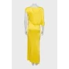 Yellow dress with brooch