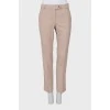 Beige tapered trousers