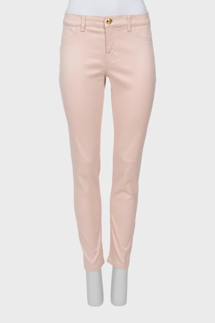 Light pink jeans with gold button