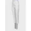 White trousers with stitched creases