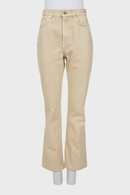 Beige jeans with gold hardware