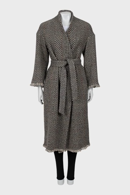 Coat with a print on the belt