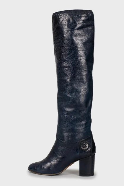 Blue leather boots with signature logo