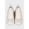 White leather sneakers with chunky soles