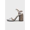 Silver sandals with decorative heels