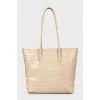 Beige tote bag with embossed leather