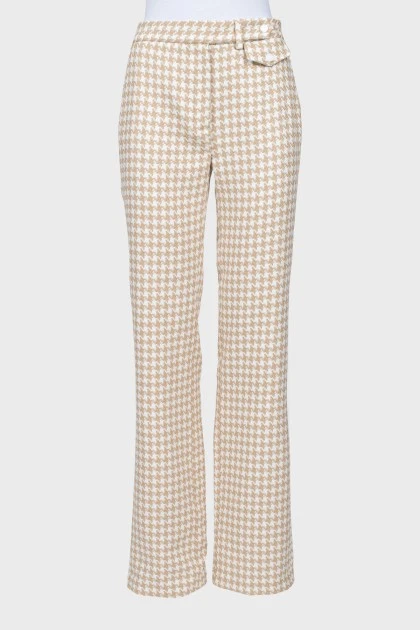 Trousers in houndstooth print with tag
