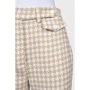 Trousers in houndstooth print with tag