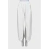 Sports white trousers with tag
