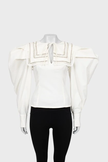 Blouse with voluminous sleeves with rhinestones