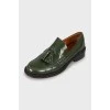 Green leather loafers