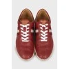 Leather burgundy sneakers with perforations
