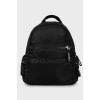 Black backpack with embossed print