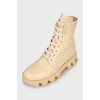 Beige leather lace-up boots
