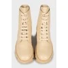 Beige leather lace-up boots