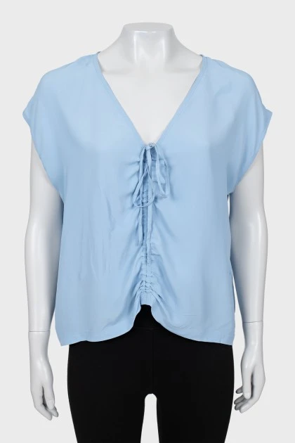 Blue blouse with ties