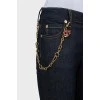 Skinny jeans decorated with chain