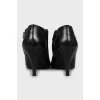 Black leather stiletto ankle boots