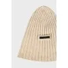 Beige knitted hat