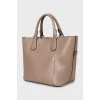 Brown tote bag with gold hardware