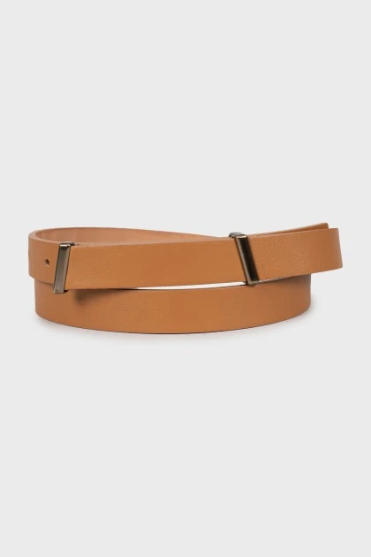 Thin brown leather belt