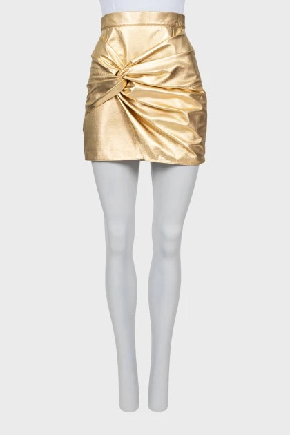 Gold leather skirt with tag