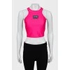 Pink sports top with tag