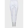 White trousers with arrows