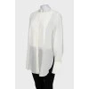 White transparent shirt with slits on the sides