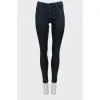 Blue skinny fit jeans with zipper at the bottom