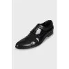 Men's black shoes with embossed leather
