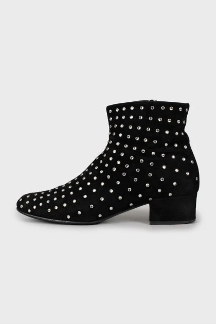 Suede boots decorated with rhinestones