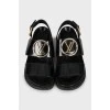 Leather sandals with signature logo