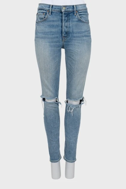 High-waisted jeans with ripped effect