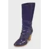 Patent leather boots with contrasting stitching