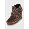 Animal print leather ankle boots