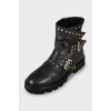 Leather boots with golden decoration