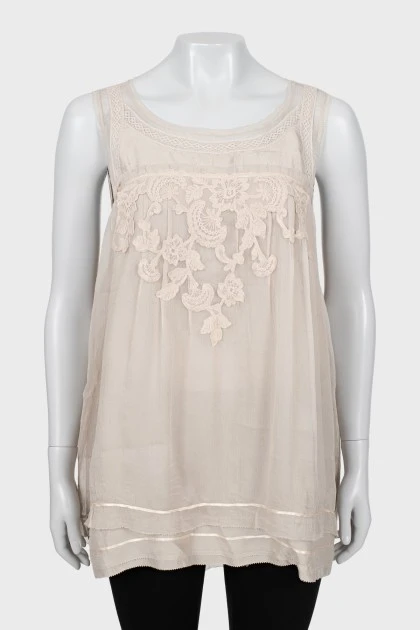 Beige sleeveless blouse