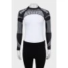 Black and white sports top with tag