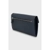 Blue leather clutch