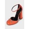 Orange leather block heels