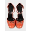 Orange leather block heels