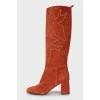 Suede boots with metallic decor