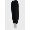 Black tapered trousers with elastic